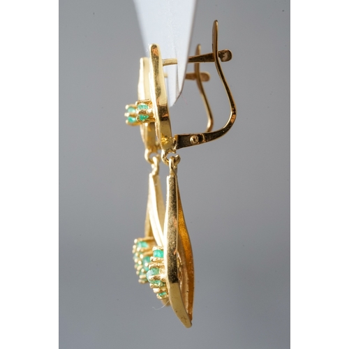 26 - An 18ct yellow gold and emerald drop earrings, post and clip fittings, total gross weight approx 3.3... 