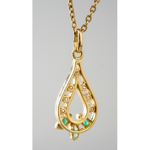 28 - A 9ct yellow gold emerald and diamond pear shape pendant necklace, set with three marquise emeralds ... 