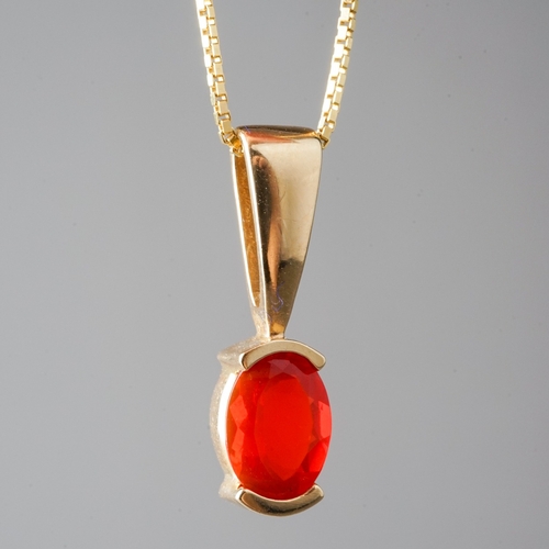 32 - A suite of 14k yellow gold and fire opal, including a ring, size N, a pendant necklace, and a pair o... 