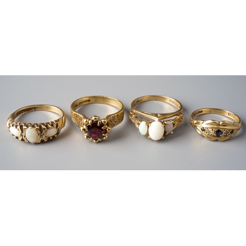 37 - A 9ct yellow gold and garnet ring, size N; two 9ct yellow gold and opal rings, sizes M and M1/2; and... 