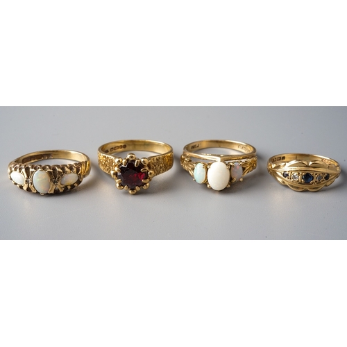 37 - A 9ct yellow gold and garnet ring, size N; two 9ct yellow gold and opal rings, sizes M and M1/2; and... 