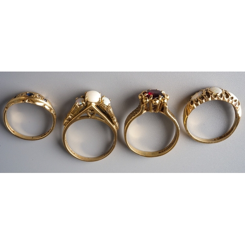 37 - A 9ct yellow gold and garnet ring, size N; two 9ct yellow gold and opal rings, sizes M and M1/2; and... 