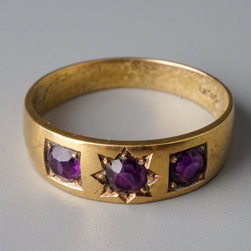 45 - A Victorian 15ct yellow gold and amethyst three-stone ring, size P, gross weight approx 3.4g