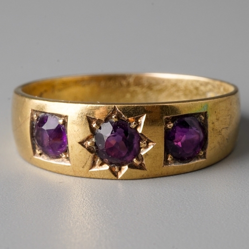 45 - A Victorian 15ct yellow gold and amethyst three-stone ring, size P, gross weight approx 3.4g