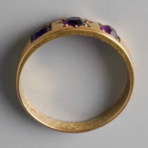 45 - A Victorian 15ct yellow gold and amethyst three-stone ring, size P, gross weight approx 3.4g