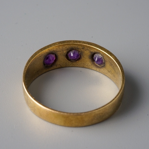 45 - A Victorian 15ct yellow gold and amethyst three-stone ring, size P, gross weight approx 3.4g