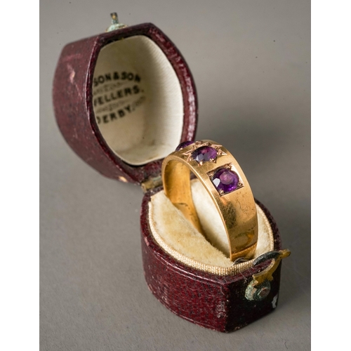 45 - A Victorian 15ct yellow gold and amethyst three-stone ring, size P, gross weight approx 3.4g