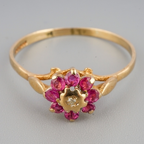 54 - A 9ct yellow gold and ruby ring, size R, gross weight approx 1.2g