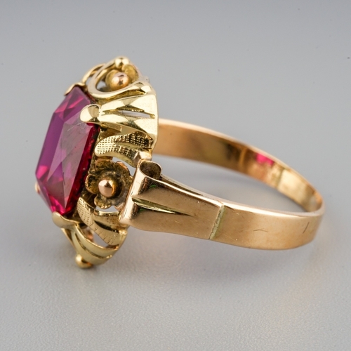 58 - A yellow gold and synthetic ruby ring, size M, unmarked assessed as approx 14k, gross weight 3.1g