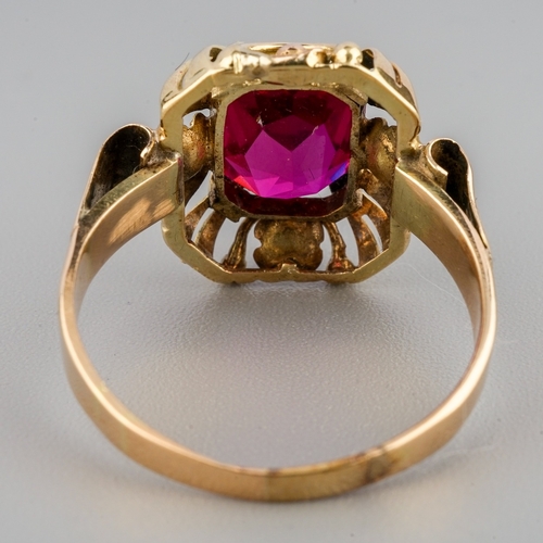 58 - A yellow gold and synthetic ruby ring, size M, unmarked assessed as approx 14k, gross weight 3.1g