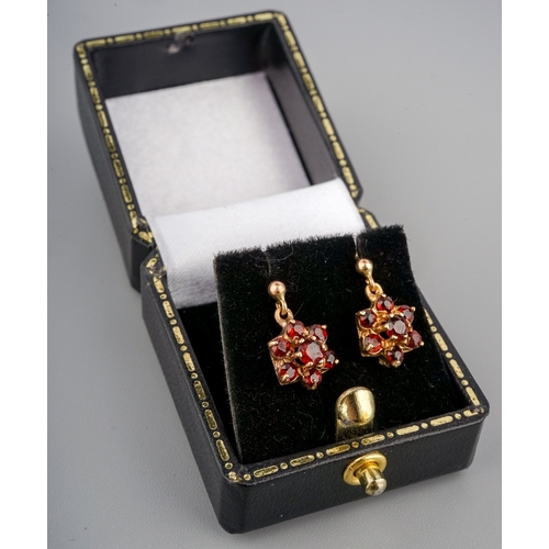 59 - A pair of 9ct yellow gold and garnet drop earrings, post and butterfly fittings, gross weight approx... 