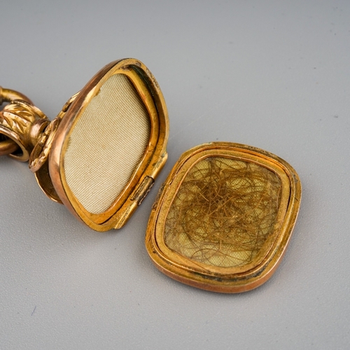 67 - 9 ct gold ladies fob watch, metal inner case, cracked glass. Suspended from silk ribbon mounted in y... 