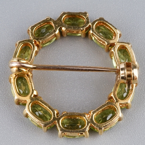 76 - Peridot 9ct Circular Brooch