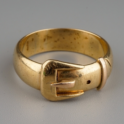 87 - A 9ct yellow gold buckle ring, size T, gross weight approx 6.3g