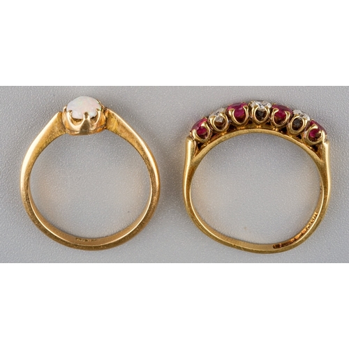 92 - An 18ct yellow gold diamond and ruby seven-stone ring, diamond weight stamped to shank '0.20', size ... 