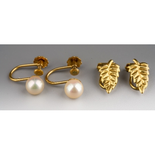 94 - A pair of 9ct yellow gold clip-on earrings, approx 1.3g; toether with a pair of 9ct yellow gold and ... 