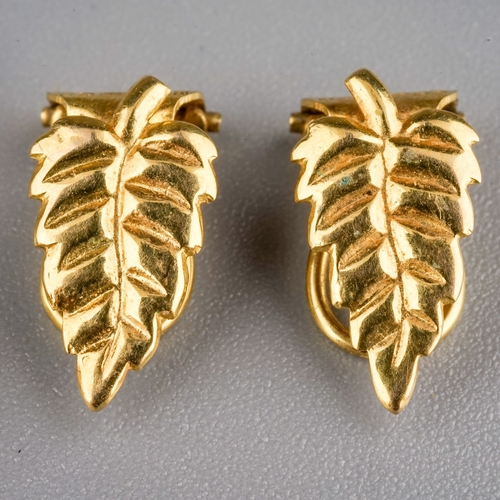 94 - A pair of 9ct yellow gold clip-on earrings, approx 1.3g; toether with a pair of 9ct yellow gold and ... 