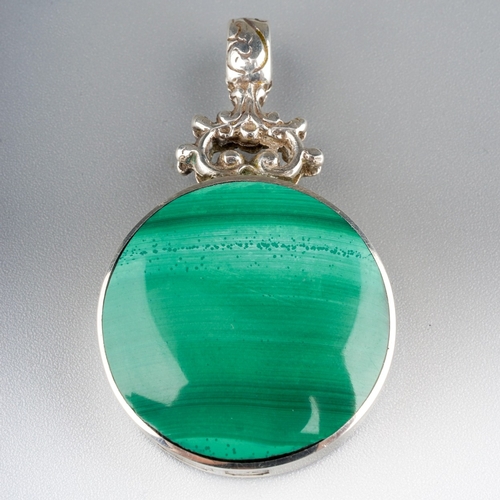 96 - A silver circular pendant, set with malachite and Blue John, approx 5cm, makers mark 'RJ', Sheffield... 