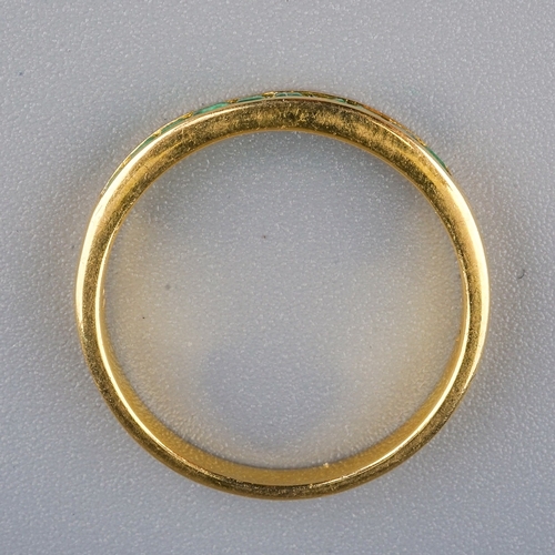 97 - A yellow gold and emerald half eternity ring, size P1/2, unmarked assessed as approx 14k-18k, gross ... 