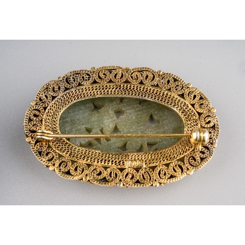 102 - A white metal a coloured paste bracelet, approx 20cm long; together with a carved green stone brooch... 