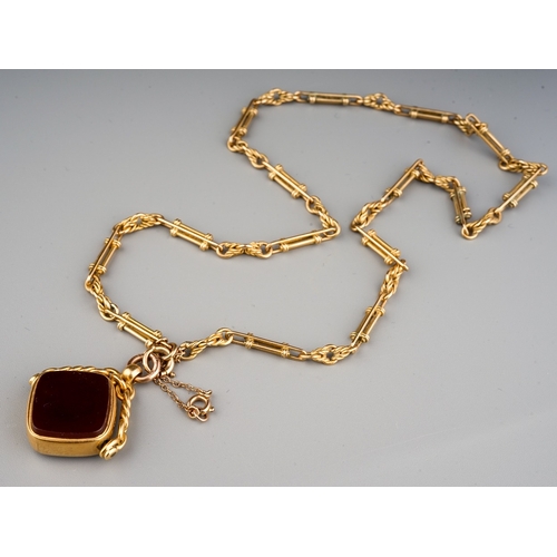 106 - Yellow metal necklace, marked 9ct to clast fitted with 18 ct gold hallmarked fob set with blood ston... 