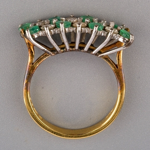 108 - An 18ct yellow gold diamond and emerald dress ring, two rows of alternating round emeralds and brill... 