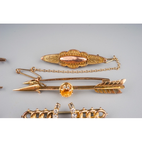 112 - A collection of Victorian and Edwardian gold bar brooches, including two 15ct yellow gold (one set w... 