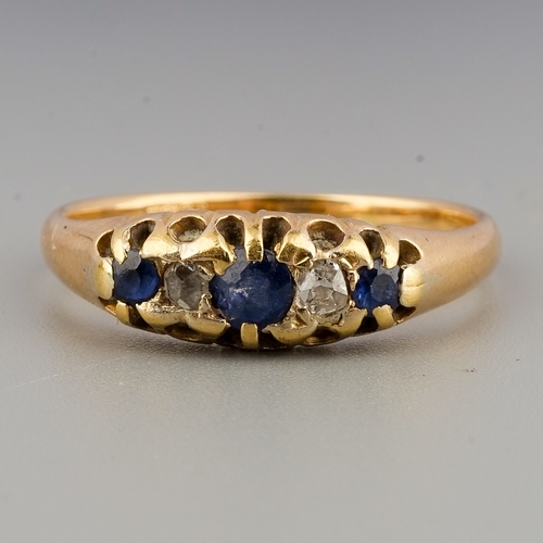 125 - 18 ct gold sapphire and diamond ring, weight 3.1 g, UK size P 1/2