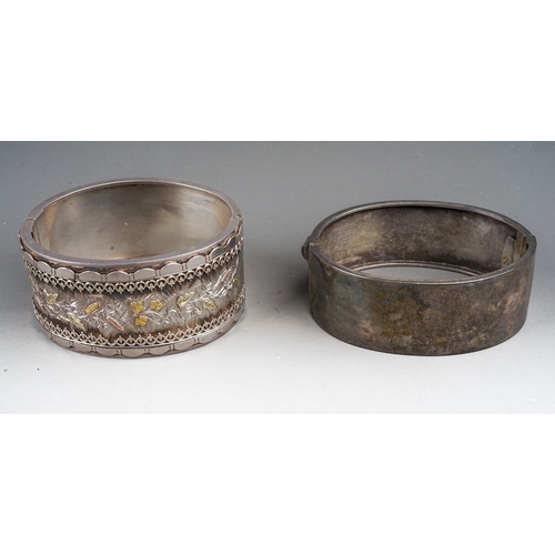 129 - Hallmarked sterling silver bangle, Birmingham 1882 together with another unmarked example, total gro... 