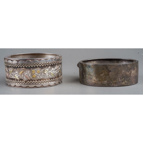 129 - Hallmarked sterling silver bangle, Birmingham 1882 together with another unmarked example, total gro... 