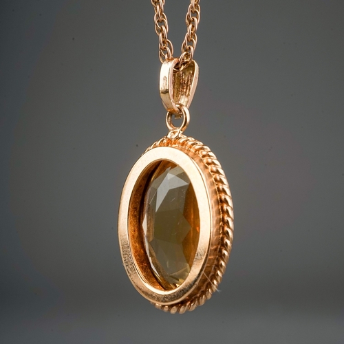 143 - 9 ct mounted citrine on 9 ct gold chain, gross weight 6.2g