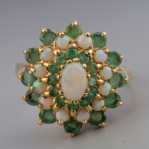 152 - A 9ct yellow gold opal and emerald oval cluster ring, size Q, gross weight approx 4.7g