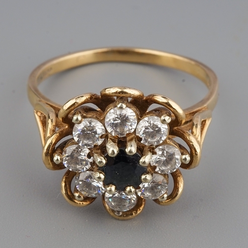 153 - A 9ct yellow gold sapphire and CZ cluster ring, size Q, gross weight approx 4.3g