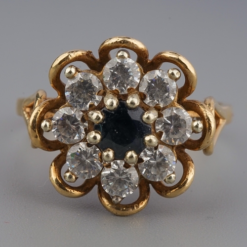 153 - A 9ct yellow gold sapphire and CZ cluster ring, size Q, gross weight approx 4.3g