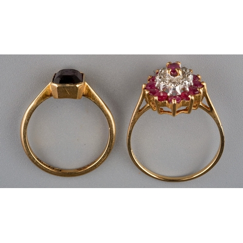 157 - A 9ct yellow gold ruby and diamond oval cluster ring, size P1/2, gross weight approx 2.5g; together ... 