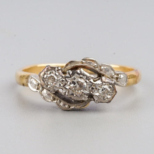 165 - An Edwardian 18ct yellow gold and diamond three-stone ring, platinum settings, size K, gross weight ... 