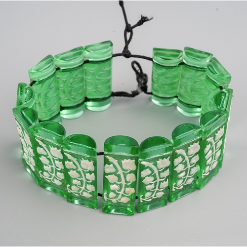 175 - Lalique green glass ( glows as uranium glass under UV 365 light) and white enamelled sectional brace...