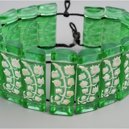 175 - Lalique green glass ( glows as uranium glass under UV 365 light) and white enamelled sectional brace... 