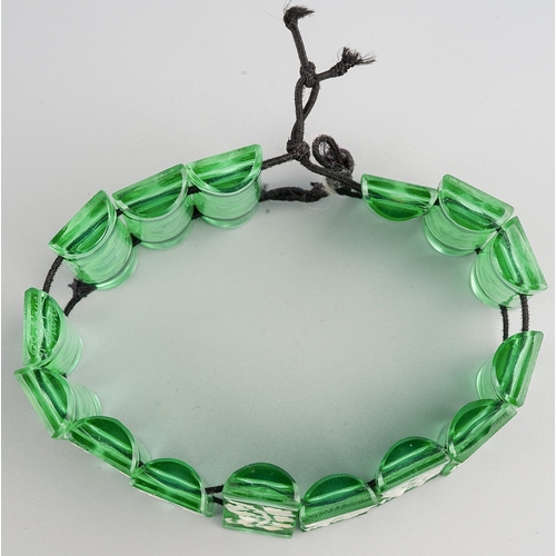 175 - Lalique green glass ( glows as uranium glass under UV 365 light) and white enamelled sectional brace... 