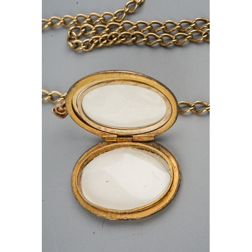 189 - A 9k yellow gold chain, approx 65.5cm long, gross weight approx 8g; together with a 9k back and fron... 