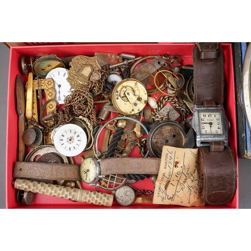 194 - A large collection of watch parts, movements, hairwork and other chains; 19th century buckle; button... 