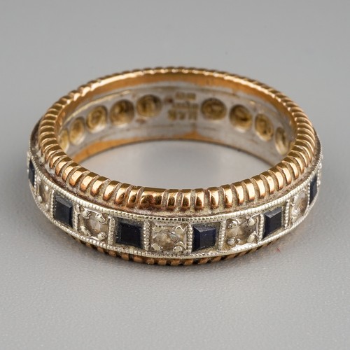 212 - A 9ct white and yellow gold eternity ring, set with alternating white and blue stones, size M, gross... 