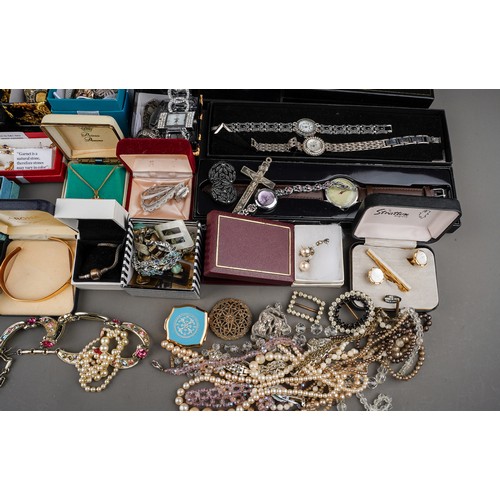 236 - Costume jewellery, including badges, brooches, garnet and pearl' watches; thimbles, compacts, earrin... 