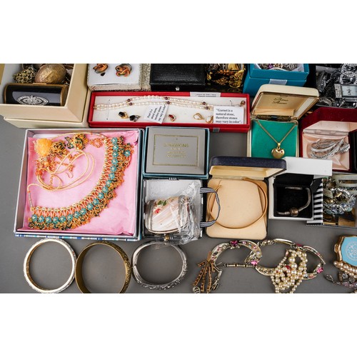 236 - Costume jewellery, including badges, brooches, garnet and pearl' watches; thimbles, compacts, earrin... 