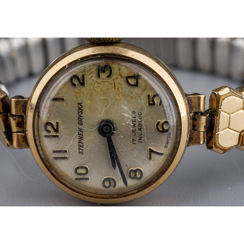 239 - Vintage ladies Steven Gryska 9 ct gold ladies wristwatch on a plated strap