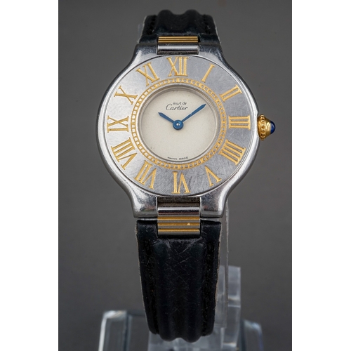 240 - Must de Cartier 21 stainless steel lady's wristwatch with black leather strap. Quartz movement.