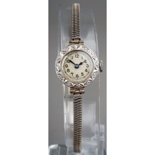 244 - Vintage ladies platinum and diamond cocktail watch, fitted with a 9 ct white gold strap. Gross weigh... 