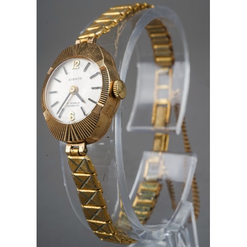 253 - A ladies 9ct yellow gold cased Everite wristwatch, on a gold-plated strap