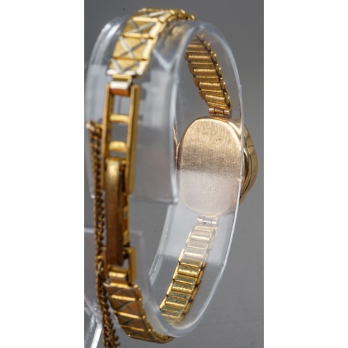 253 - A ladies 9ct yellow gold cased Everite wristwatch, on a gold-plated strap