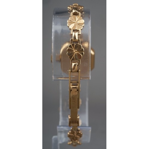 257 - 9 ct gold ladies Tudor Royal wristwatch, on 9 ct gold strap, currently ticking. Gross weight 17g.